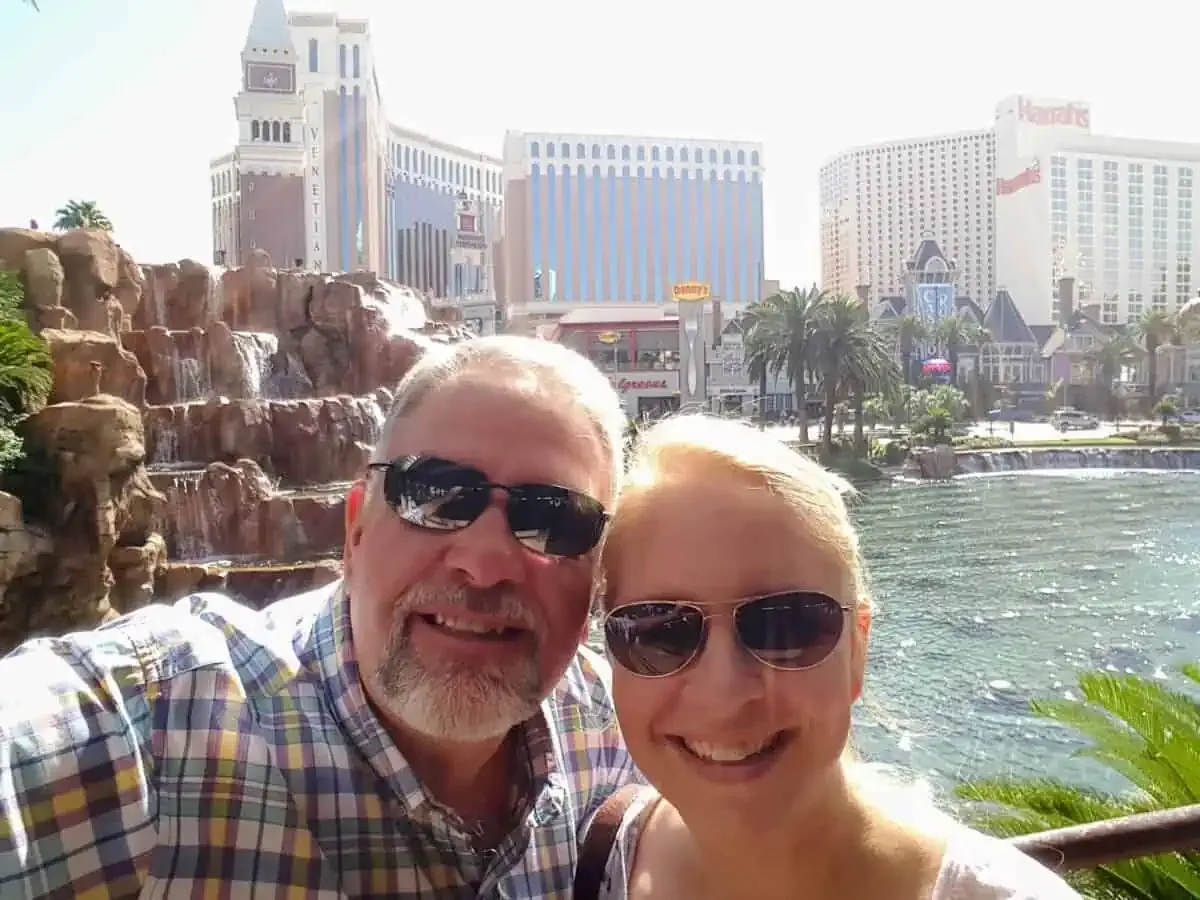 Bob and Jenn Bassett of Vegas Food & Fun in front of the Mirage volcano