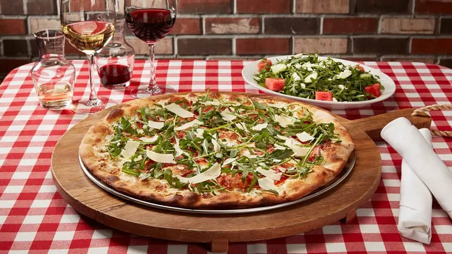 Grimaldis Pizzeria prosciutto arugula pizza n watermelon salad