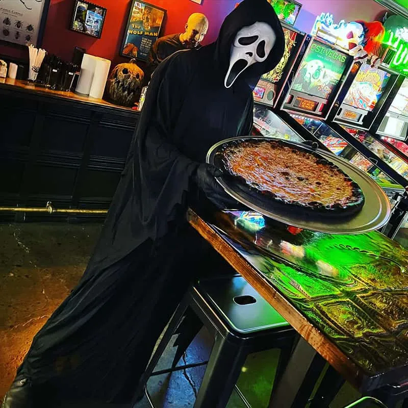 Unique Horror-Themed Menu at Sliced Pizza Shop