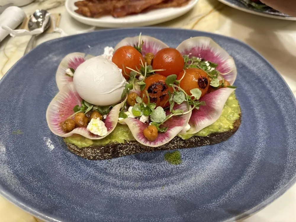 Avocado toast with a poached egg