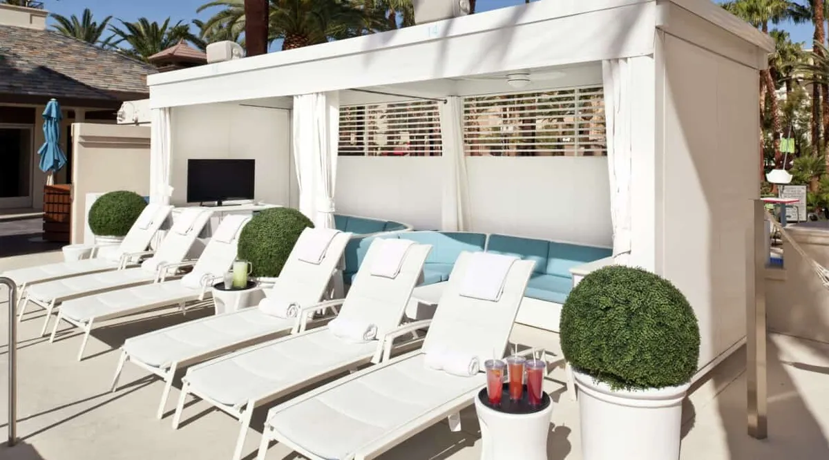 Row of lounge chairs at Delano Beach Club
